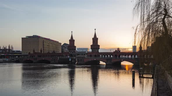 Night to Day Time Lapse of Oberbaumbruecke with Spree River, Berlin, Germany