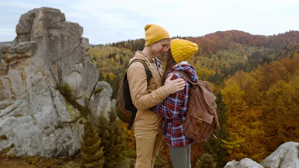 Couple Hikers Hipsters Stands on Autumn Landscape Background with Cliffs in National Park Tustan alt