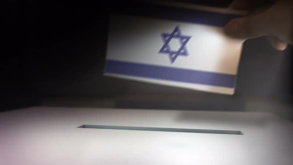Israel_election_box_hand.mov alt