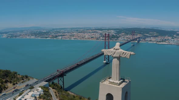 Drone footage of of Statue Santuario De Cristo Rei, Lisbon Portugal 4K