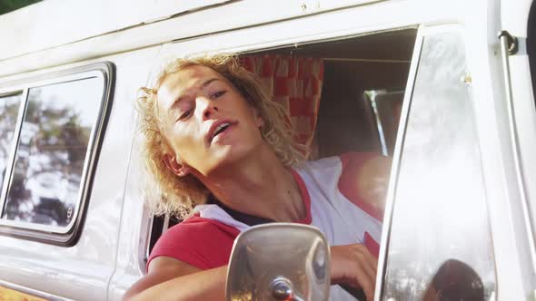 Man interacting while driving van 4k alt