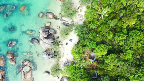 Aerial above landscape of beautiful lagoon beach trip by blue green ocean with white sand background alt