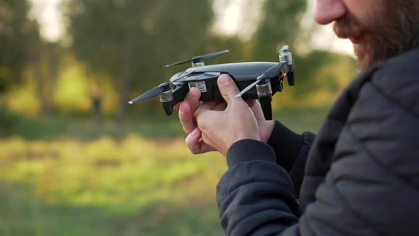 Man Calibrates Drone alt