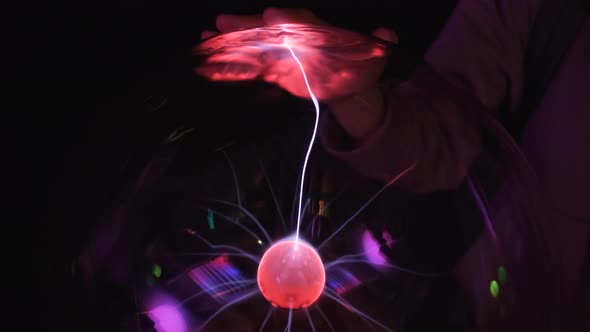 Working Plasma Globe or Plasma Lamp is a Clear Glass Ball Filled with a Mixture of Various Noble