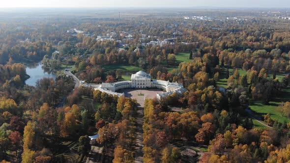 Aerial View of the Beautiful Pavlovsk Palace in the Middle of the Autumn Park alt