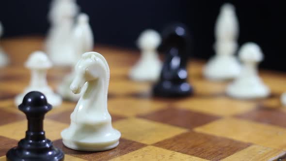 Whitehorse Overthrows The Black Rook On A Chessboard alt