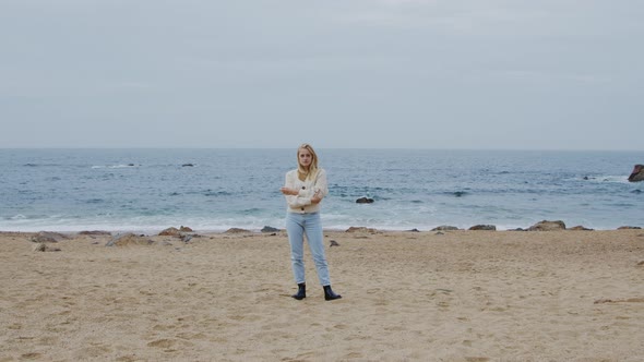 Portrait of Blonde Woman On Ocean Coast