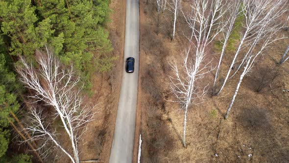 Aerial view of car moving on the road