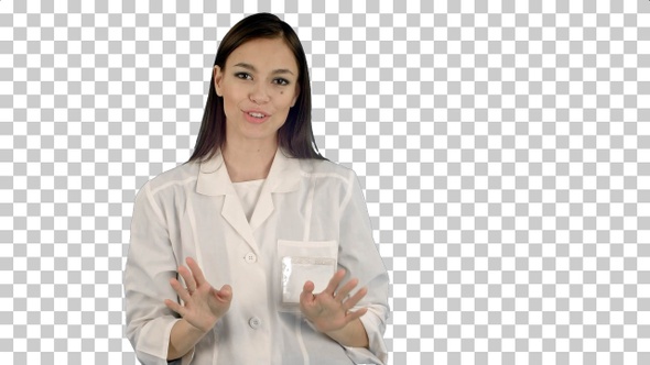 Smiling young woman in lab coat talking, Alpha Channel