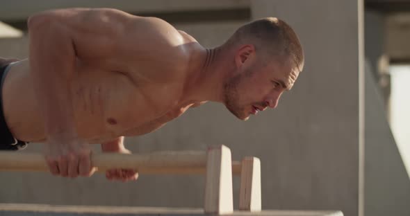 Sweaty Sportsman Doing Push Ups alt