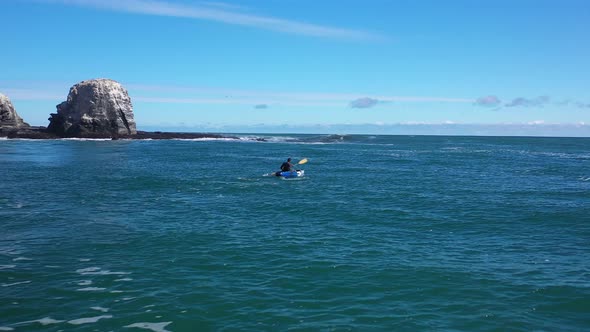 surfing in punta de lobos chile sunny day incredible landscape recorded with drone and kayak fishing alt