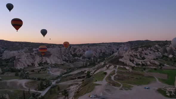 parade of balloons taking off at dawn in Cappadocia. travel concept