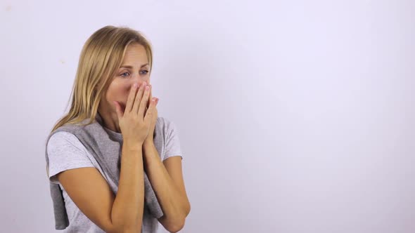 Young Woman Coughs Violently, Covering Her Mouth