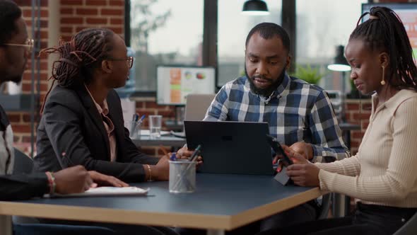 African American Team of People Collaborating on Business Strategy ...