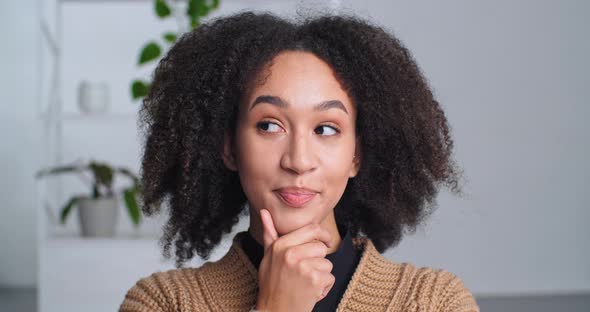 Portrait Pensive Flirtatious Afro American Girl Ethnic Woman Sitting Touching Her Chin with Finger alt