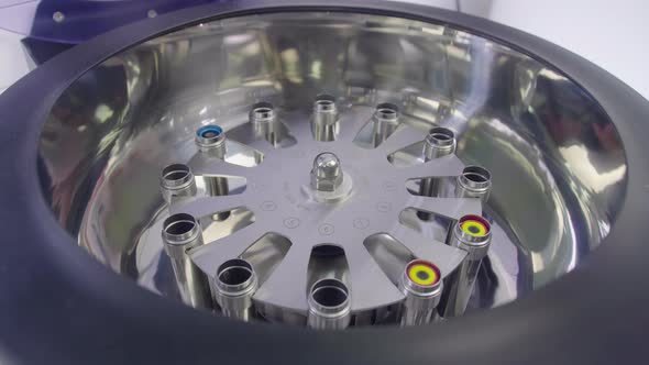 Test Tubes With Blood Samples And Test Materials Are Mixed In A Special Medical Machine alt