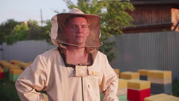 Portrait of a Young Owner of an Apiary on Which He Breeds Bees and Extracts Honey