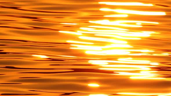 Close up Sun Reflecting in Water With Audio