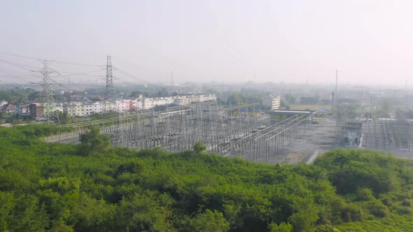Aerial view of electricity generating, voltage poles. Power lines on utility tower and cable wires alt
