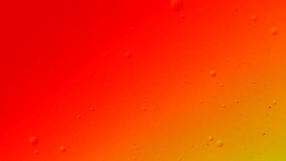 soft color-changing and intermingling oil colors with small bubbles on the surface alt