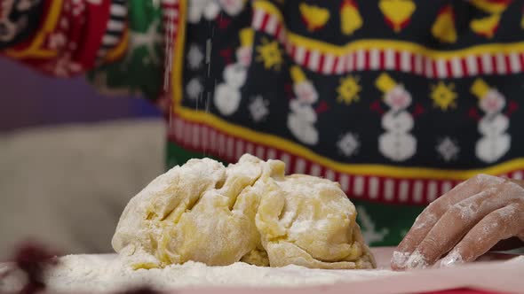 Little African American Girl in a Christmas Print Sweater Preparing Dough for Christmas Homemade alt