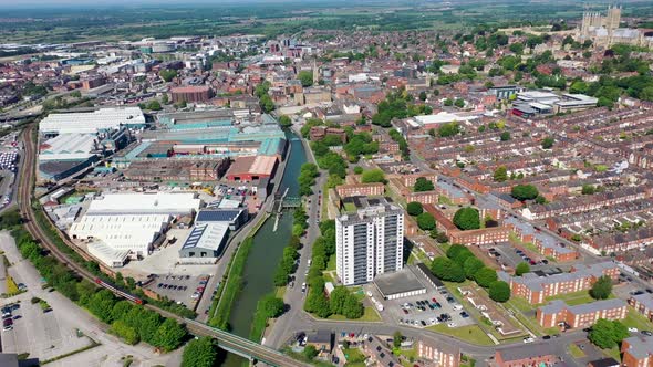 Aerial footage of the city centre of Lincoln on a bright sunny summers day in the UK alt