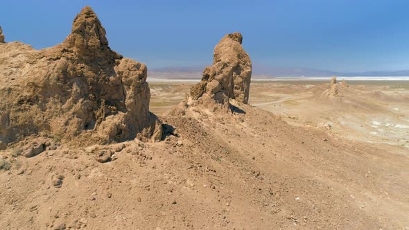 Aerial  Shot of Dumpy and Mounded Cone Shapes Lay Scattered Throughout the Trona Pinnacles alt