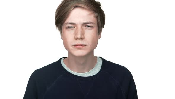 in Slow Motion Portrait of Young Aggressive Teen Looking on Someone Showing I'm Following you with alt