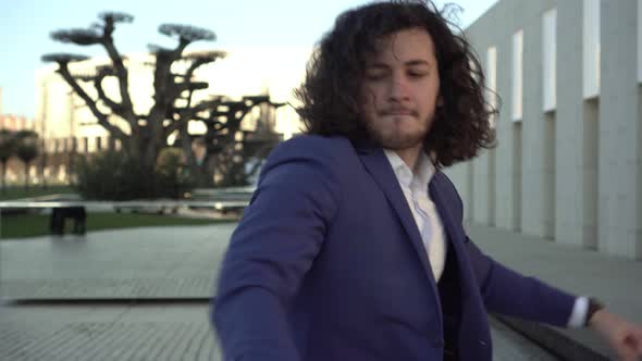 Happy Businessman Rejoices and Dances alt