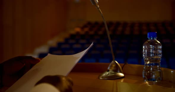 Senior African American businessman practicing speech in empty auditorium 4k alt