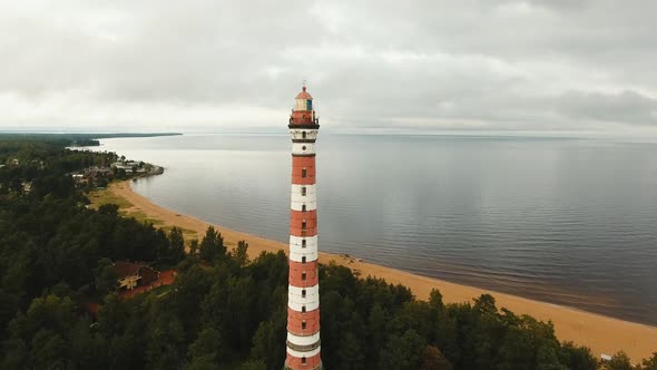 Old Lighthouse on the Coast. alt