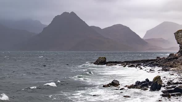 Elgol Beach at Port Na Cullaidh with Red Cuillin Mountains Under Clouds on Loch Scavaig Scottish alt