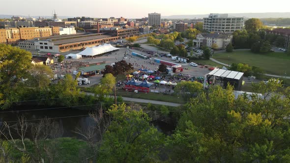 Aerial view of downtown La Crosse, Wisconsin, with festival and river seen.