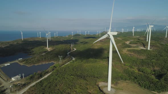 Solar Farm with Windmills. Philippines, Luzon alt