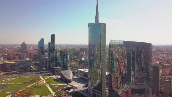Milan City Skyline Aerial View Flying Towards Financial Area Skyscrapers alt