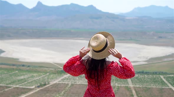 Mother Near the Lake at the Day Time