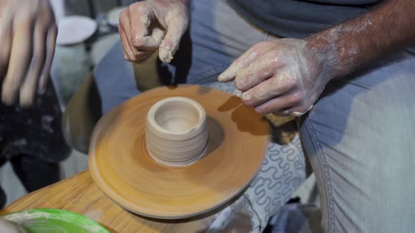 Making a Handmade Clay Pot in the Workshop. Pottery Lesson with Master. alt