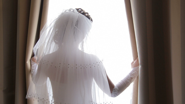 Bride Looks out the Window