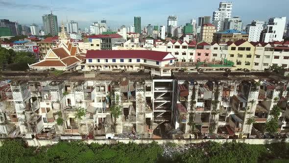 Aerial view of a abandoned building on urban area, Cambodia. alt