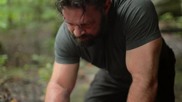 Detail of Man Building a Campfire