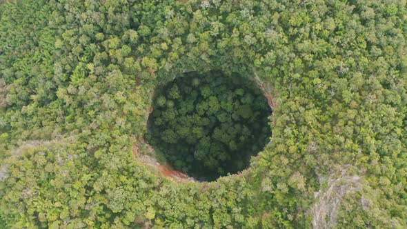 Aerial top view of Spirit Well Cave, Pang Mapha District, Mae Hong Son, Thailand. Tourist attraction alt