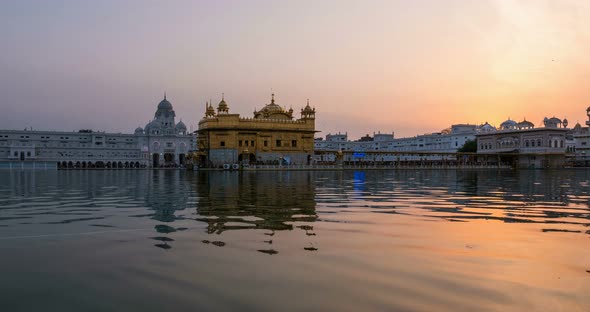 The Golden Temple at Amritsar, Punjab, India. Time lapse from dawn to sunrise alt