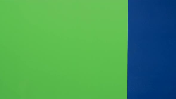 Child Boy Is Over the Board Then Appears and Waves His Hand in Front on a Green Screen alt