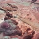 Drone Tracking SUV Car Driving in Cinematic Painted Red Desert in Utah USA - VideoHive Item for Sale