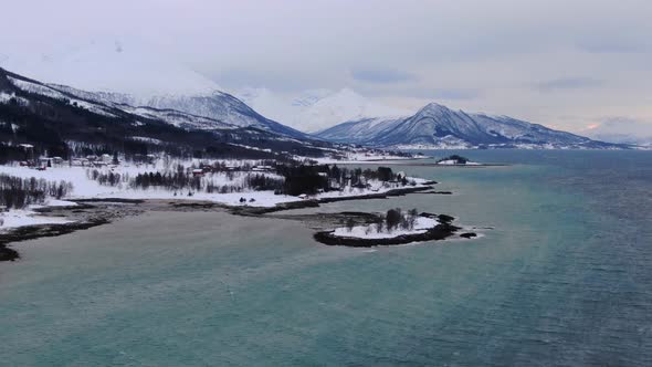 Aerial view of a fjord and mountains near Tromso city in Northern Norway, Arctic alt