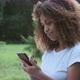 Young Mixed Race Woman Looking at Smartphone Screen - VideoHive Item for Sale