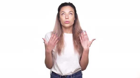 Portrait of Nervous Female Employee with Long Hair Gesturing for Fresh Air Being Stressed Before Job alt