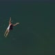 Top View of a Young Woman Swimming - VideoHive Item for Sale