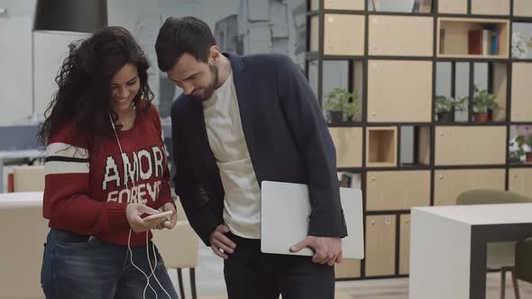 Colleagues at Work Discussing Plans Being in a Pleasant Cozy Atmosphere alt