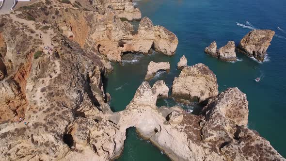 Aerial view of Ponta da Piedade rock formations in Lagos, Portugal alt